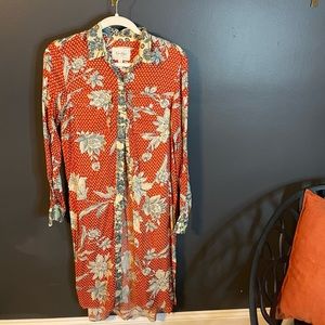 Jessica Simpson Long button up with splits down the sides. Size S. Floral. NWOT
